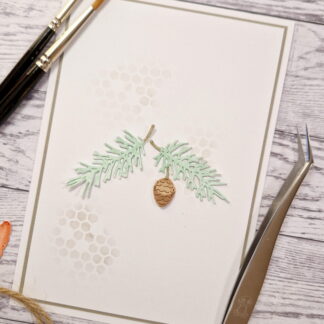 Two pine sprigs with pine cone
